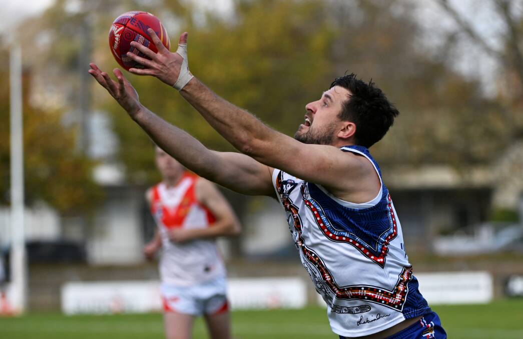 East Point's Jackson Merrett stretches for a mark against Ballarat. Picture by Lachlan Bence