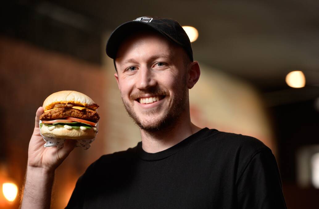GOOD CAUSE: Sam Griffin from Griffin Burger with the 'Little George'. Photo: Adam Trafford