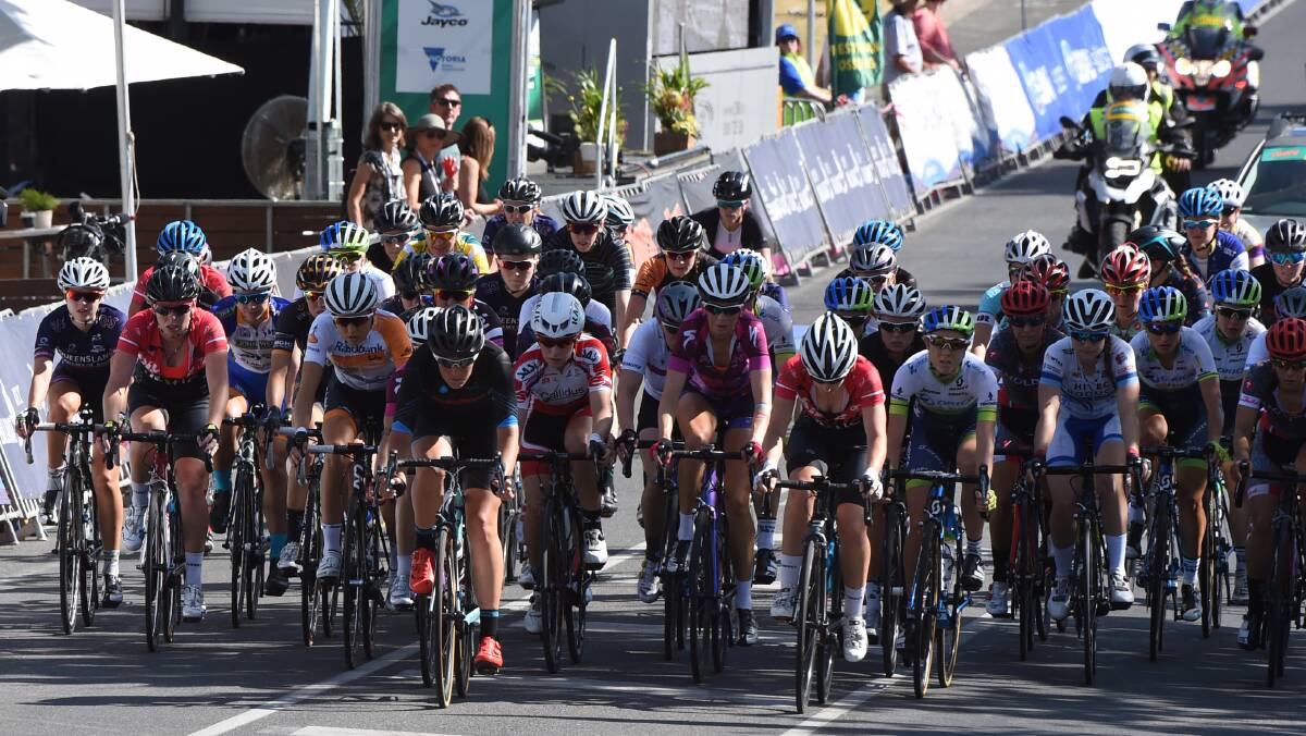 CHASERS: The main bunch rolls through to tick off another lap in the elite women's road race. Picture: Lachlan Bence