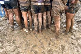 Players across the CHFL were tested in wet and muddy conditions on Saturday. Picture by David Brehaut
