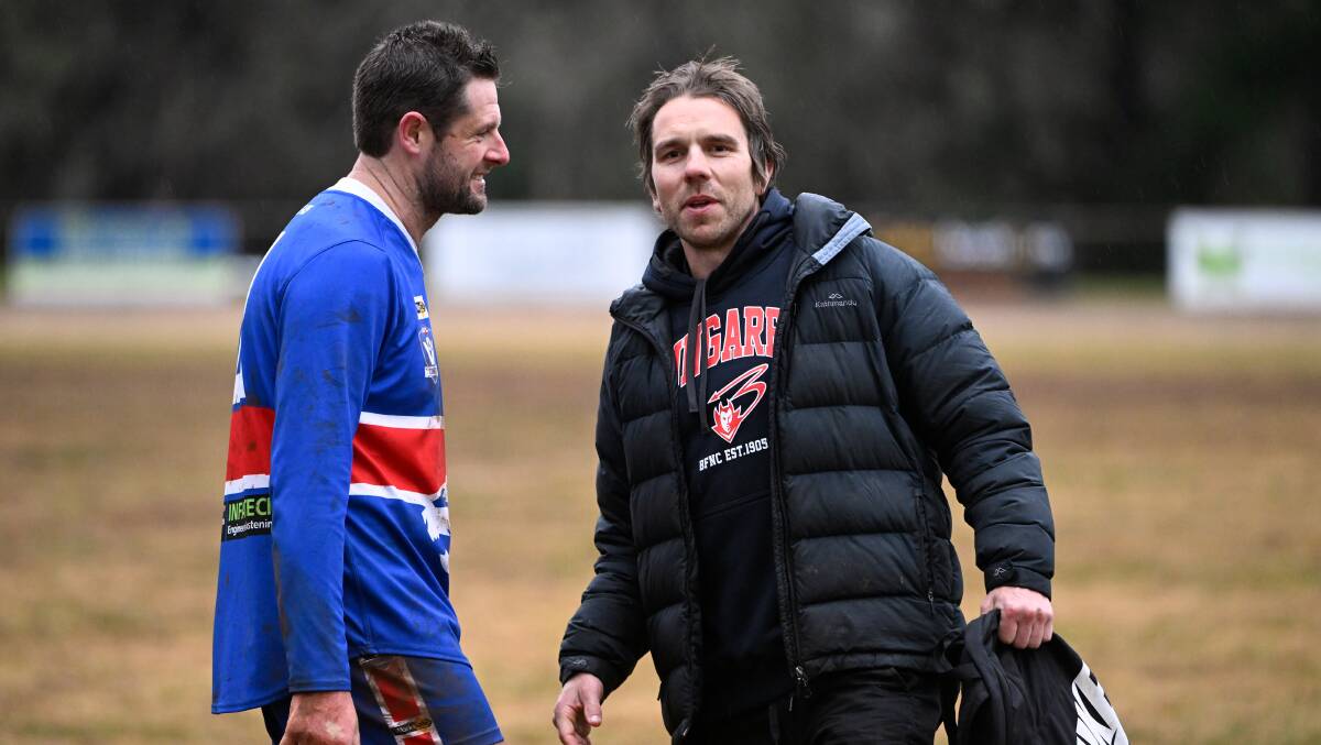 Daylesford veteran defender James Evans and Bungaree coach Ryan Waight share some banter after the final siren at Daylesford. Picture by Adam Trafford.