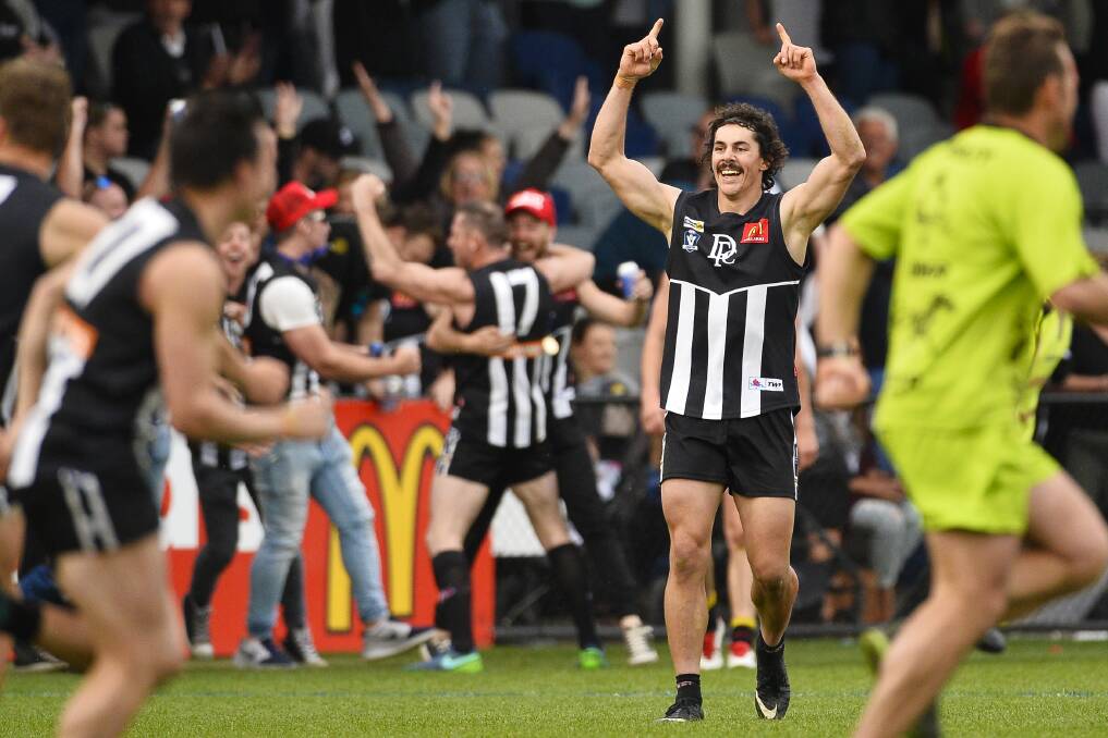 Dan Roy celebrates after the final siren during the 2017 grand final. 