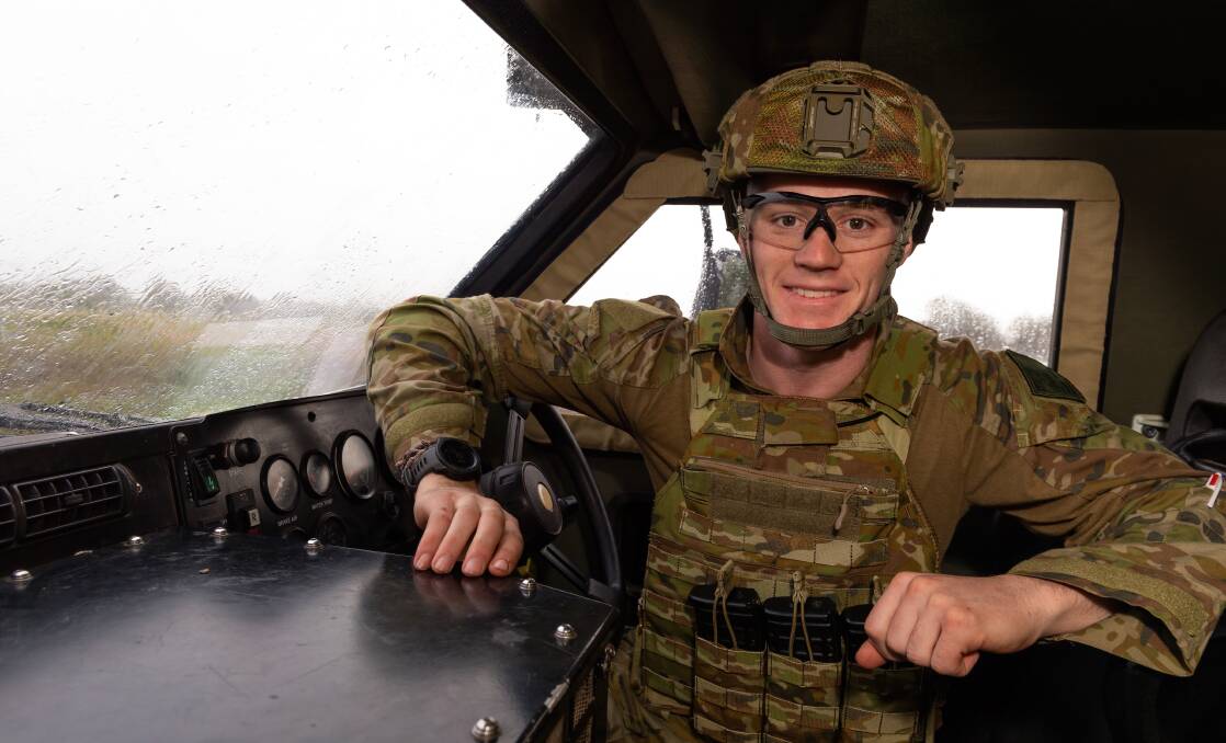 Private Jeremy Janson behind the wheel of a Bushmaster protected military vehicle during Exercise Talisman Sabre in Queensland. Picture by Corporal Michael Currie