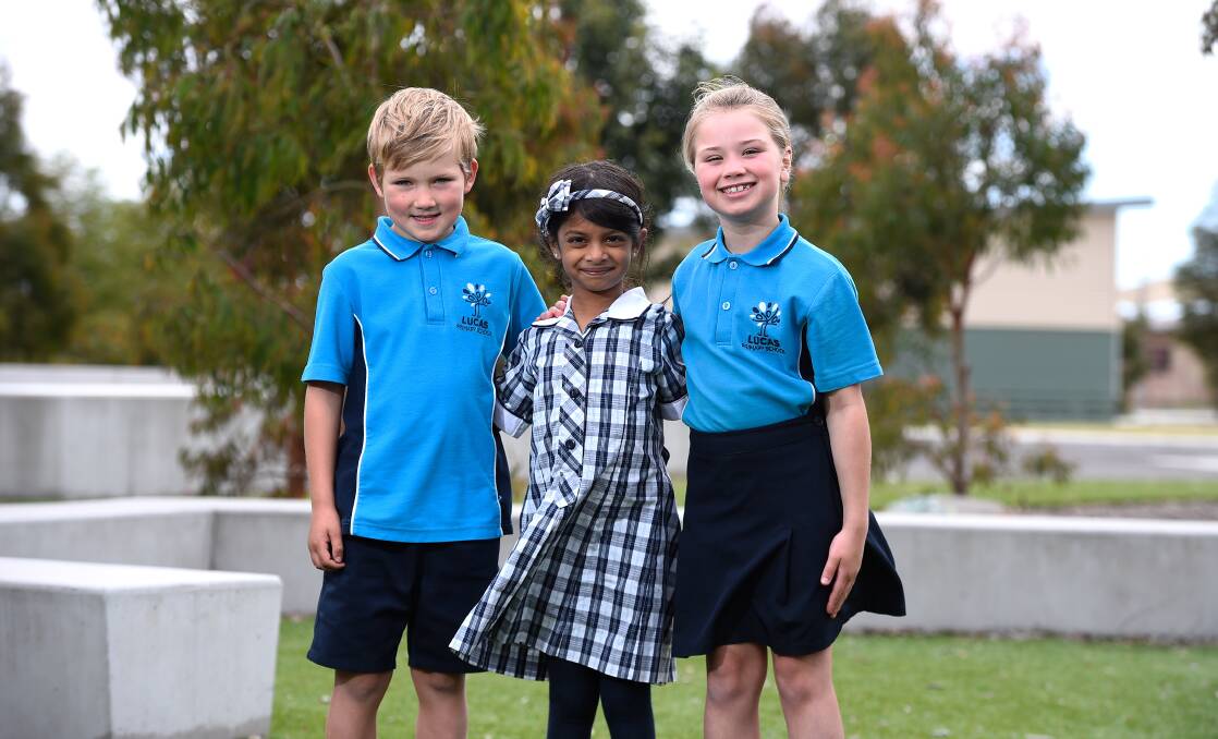 Lucas Primary School pupils Oliver, Bivonya, Olive are among the rapidly growing school population, which has leapt from 70 in 2020 to 355 this year. Picture by Adam Trafford