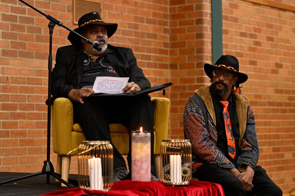 Uncle Alan Harris and his son Tristan Harris at the National Sorry Day commemoration at Loreto College. Picture by Adam Trafford

