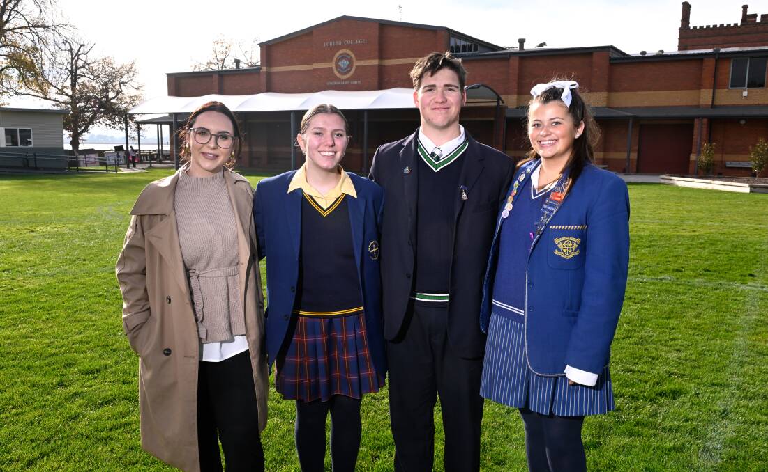 Former Loreto student Macaylah Johnson who performed the Welcome to Country, pictured with students Lucy Gravell of Damascus College, Lachlan Thurling of St Patrick's College and Ella McCormack of Loreto College who emceed the event. Picture by Adam Trafford 