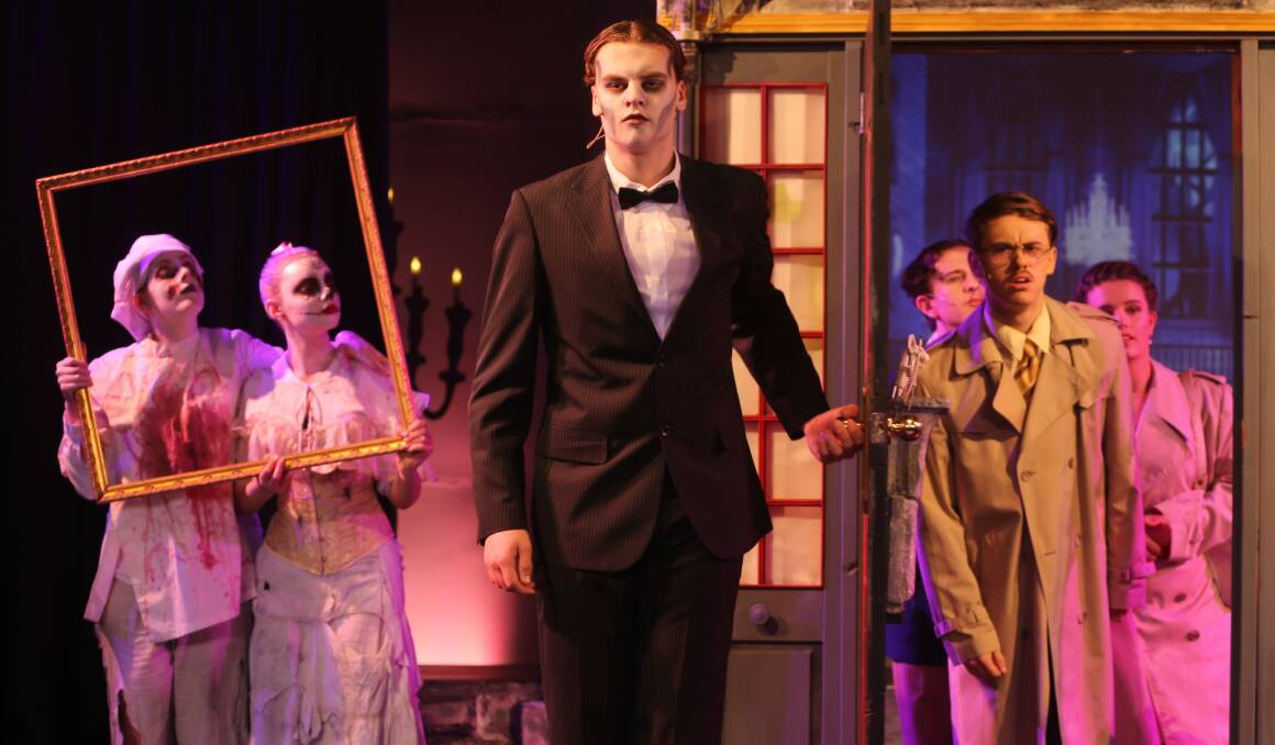 The lives of Lurch and other members of the Addams Family on stage in Damascus College's sold-out season of their The Addams Family production. Picture supplied 