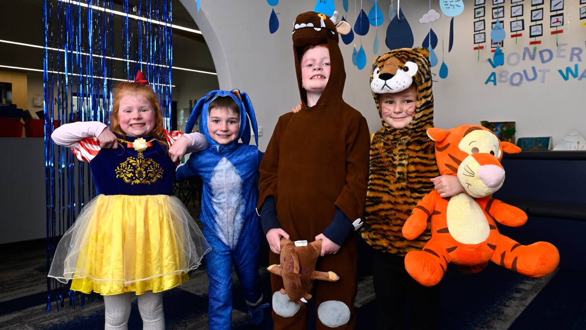 Evelyn as Snow White, Jake as Sonic the Hedgehog, Hudson as the Gruffalo and Evie as Tigger for Miners Rest Primary School Book Week celebrations. Picture by Adam Trafford
