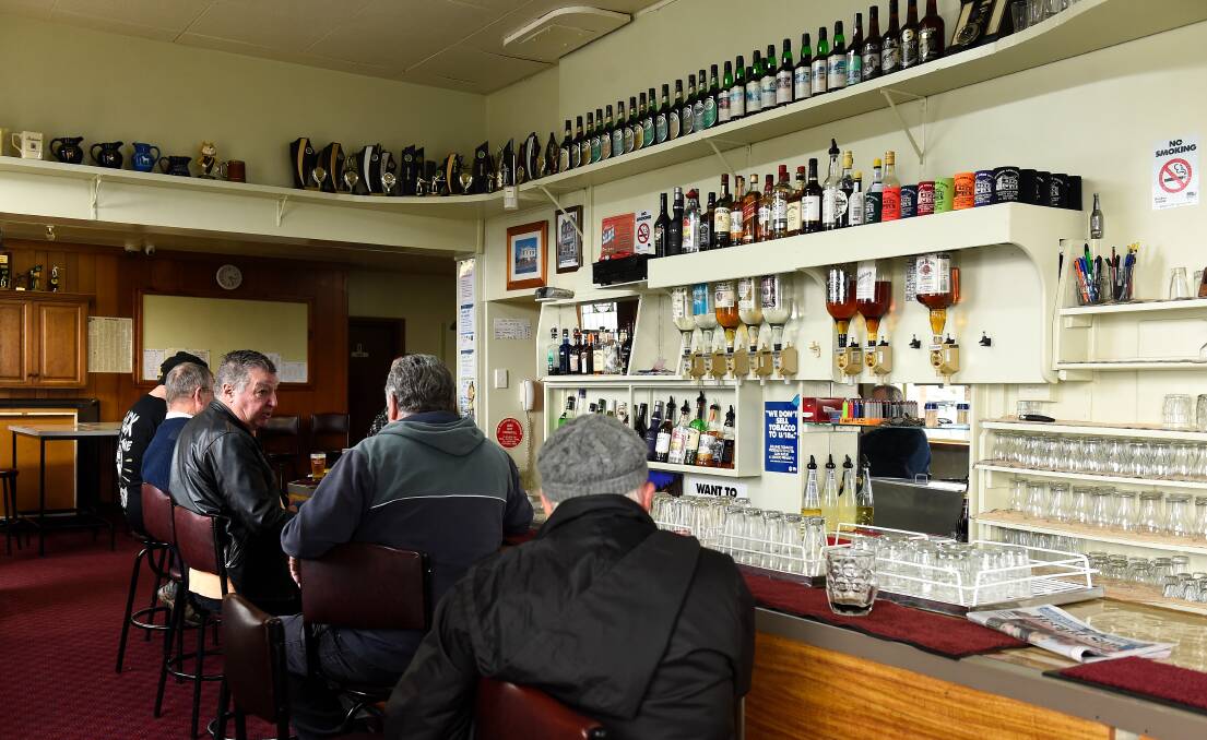 Regulars enjoy a drink in the old-style bar at the Millers Arms Hotel in Soldiers Hill. Picture by Adam Trafford