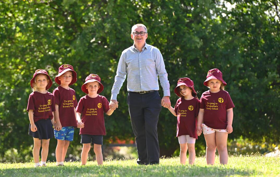 St Augustine's Primary School principal Michael Heenan with 2024 preps Alannah, Jack, Charlie, Emmie and Marija. Picture by Adam Trafford