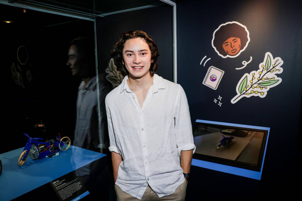 Luke Tan with his self balancing motorbike, created during his VCE Systems Engineering course, on display at Melbourne Museum.. Picture by Nicole Cleary Photography