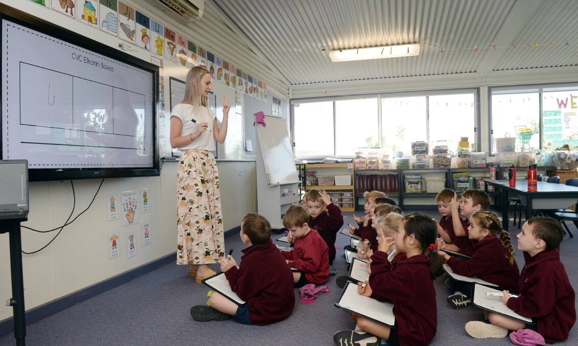 Mount Blowhard Primary School prep teacher Zoe Barendsen teaching her young charges the basics of literacy. Picture by Kate Healy