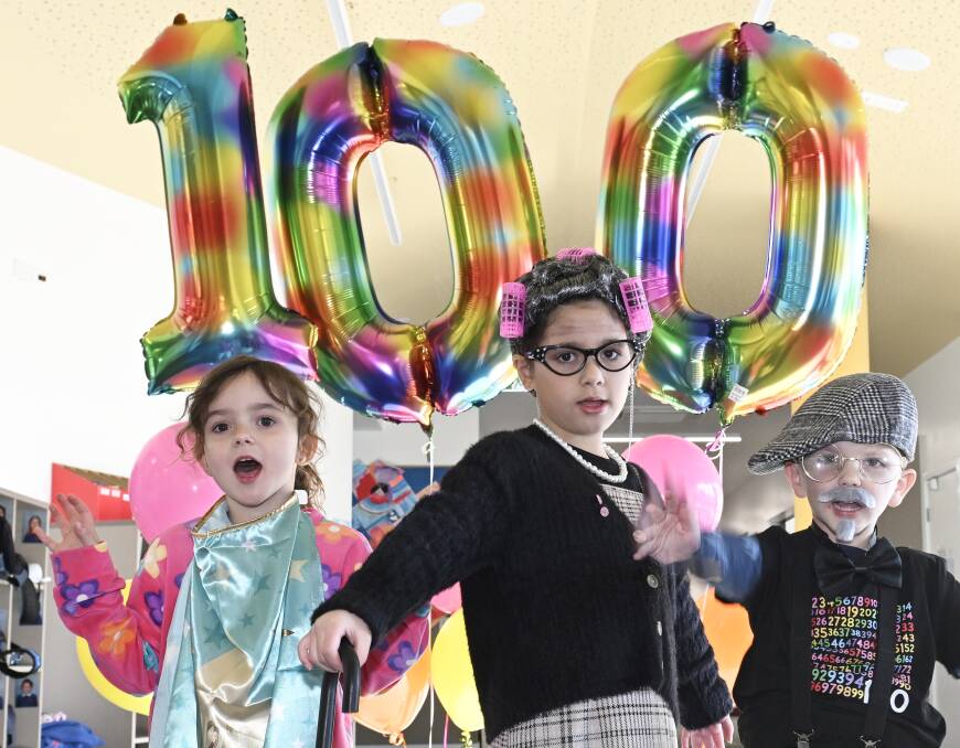 Forest Street Primary pupils Bella, Letti and Oliver celebrate reaching 100 days of school. Picture by Lachlan Bence