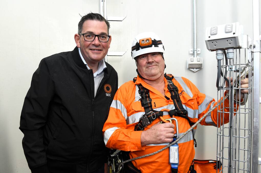 Premier Daniel Andrews with Ray Borowiak inside the wind turbine training tower at Federation TAFE. Picture by Adam Trafford