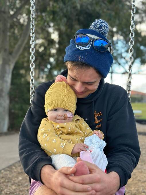 Zarliah spends time on the playground with dad Jake. Picture supplied