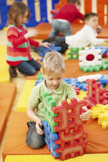 Children enjoy playing with blocks. File picture
