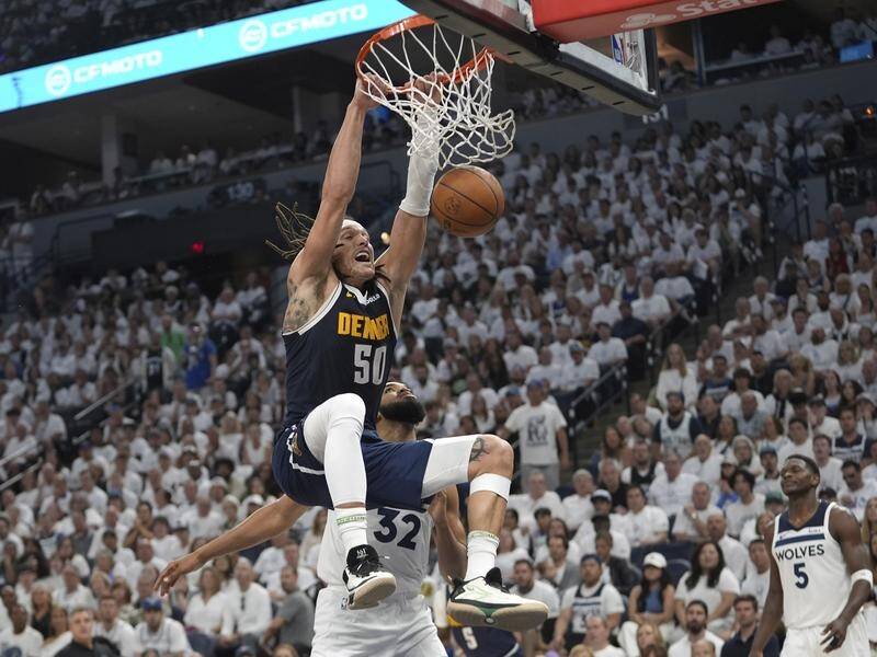 Standout Aaron Gordon dunks for Denver in their series-levelling win over Minnesota. (AP PHOTO)