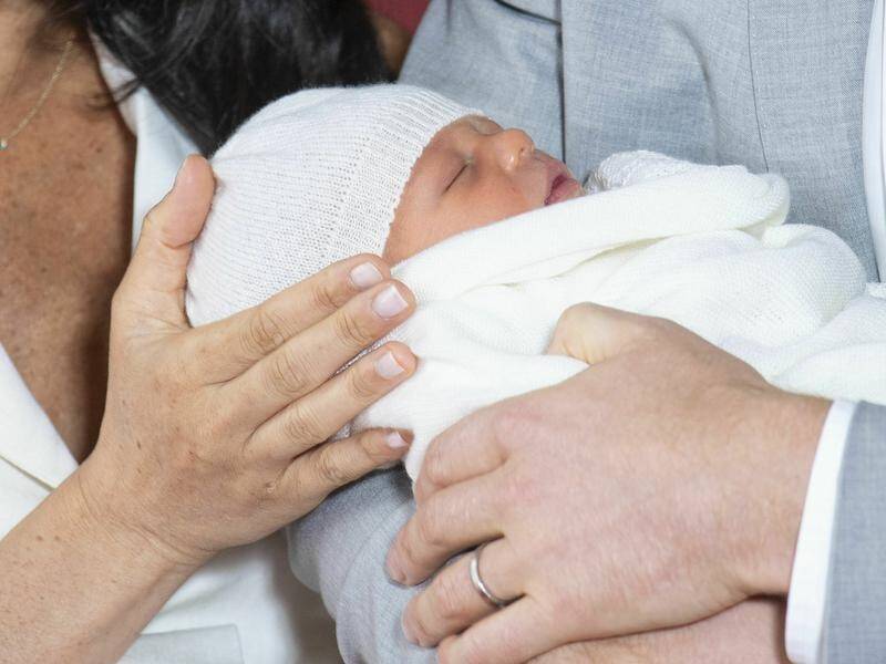 The Duke and Duchess of Sussex have shown off their new baby boy in a photocall at Windsor Castle.