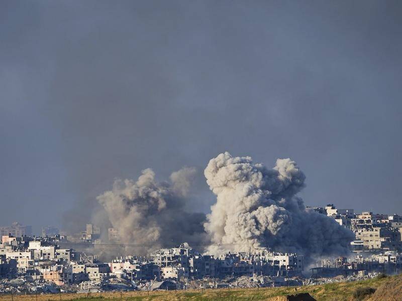 Israel's bombardment of the Gaza Strip continues as it shows signs it may be open to negotiations. (AP PHOTO)