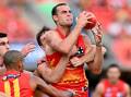 Gold Coast's Jarrod Witts is aware of the significance of the QClash with the Brisbane Lions. (Dave Hunt/AAP PHOTOS)